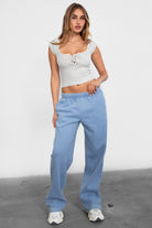 LANI wide-leg joggers in stone blue fleece, featuring elastic waistband and adjustable drawcord