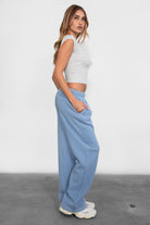 LANI wide-leg joggers in stone blue fleece, featuring elastic waistband and adjustable drawcord