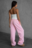 LANI wide-leg joggers in blush fleece, featuring elastic waistband and adjustable drawcord