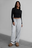 LANI wide-leg joggers in heather grey fleece, featuring elastic waistband and adjustable drawcord