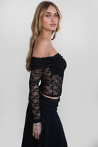 TIC TOC LUCY Stretch Lace Long Sleeve Top in black, off-the-shoulder design