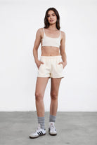 Cream fleece short set with an ultra-cropped cami top and matching high-waisted shorts by Tic Toc.