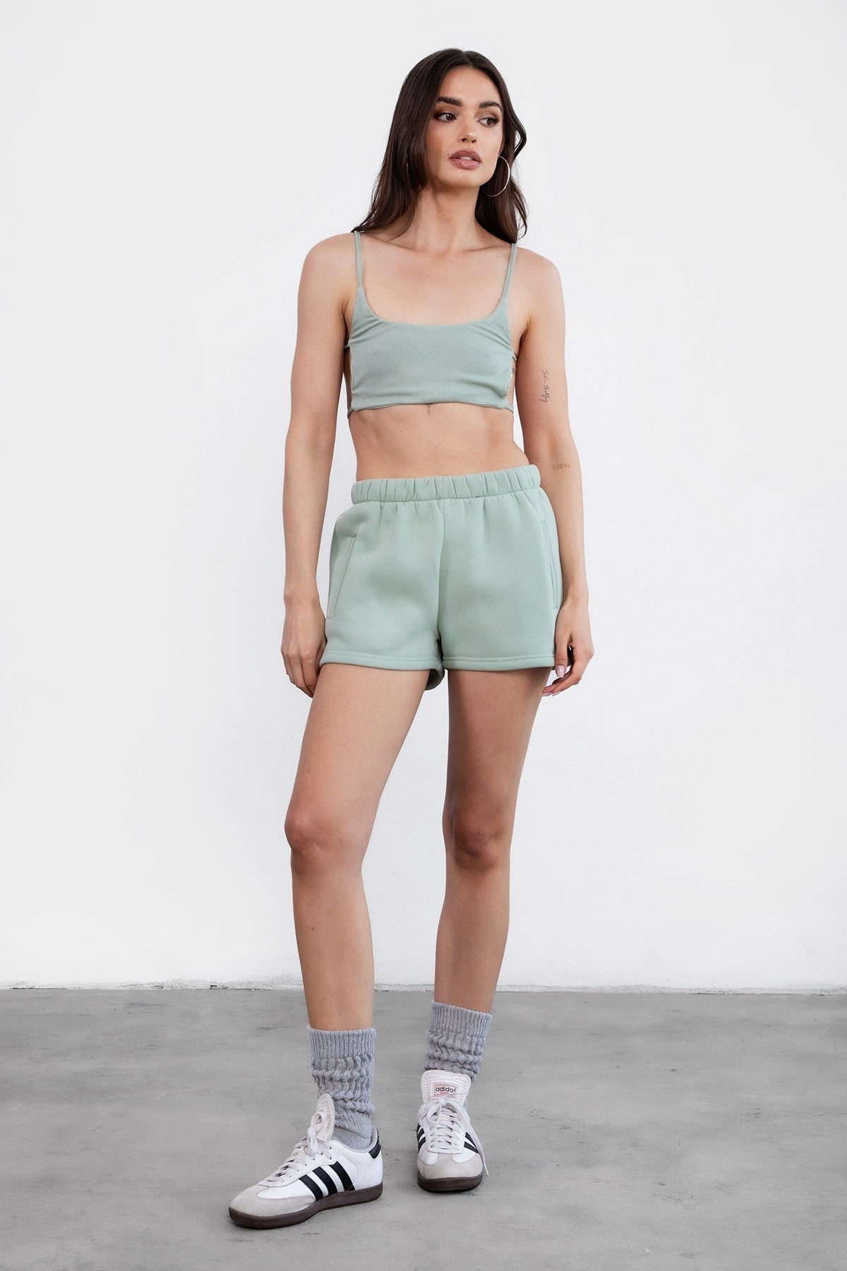  Sage green fleece short set with deep reversible side pockets and a smooth fleece texture by Tic Toc.