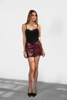 NAOMY vegan leather skirt with edgy snake print for a bold look