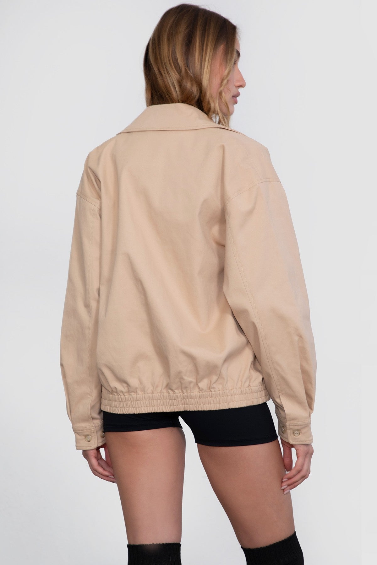 TIC TOC light khaki bomber jacket featuring elastic cuffs and waistband