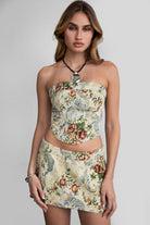 Floral tapestry-inspired strapless corset top by TIC TOC with boned construction