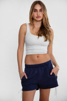 Game day mid-rise fleece shorts in cozy plush fabric with adjustable waistband color navy