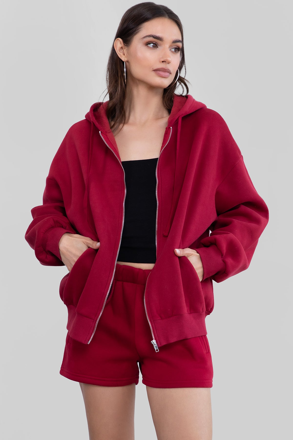 Burgundy oversized fleece hoodie with a relaxed fit, perfect for layering and casual wear by Tic Toc.