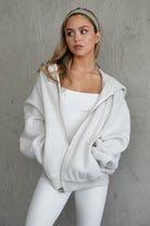  Heather white zip-up hoodie with an oversized fit, perfect for relaxed everyday wear by Tic Toc.