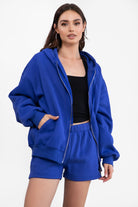 Royal blue fleece zip-up hoodie with a relaxed fit, perfect for layering during cooler weather by Tic Toc.