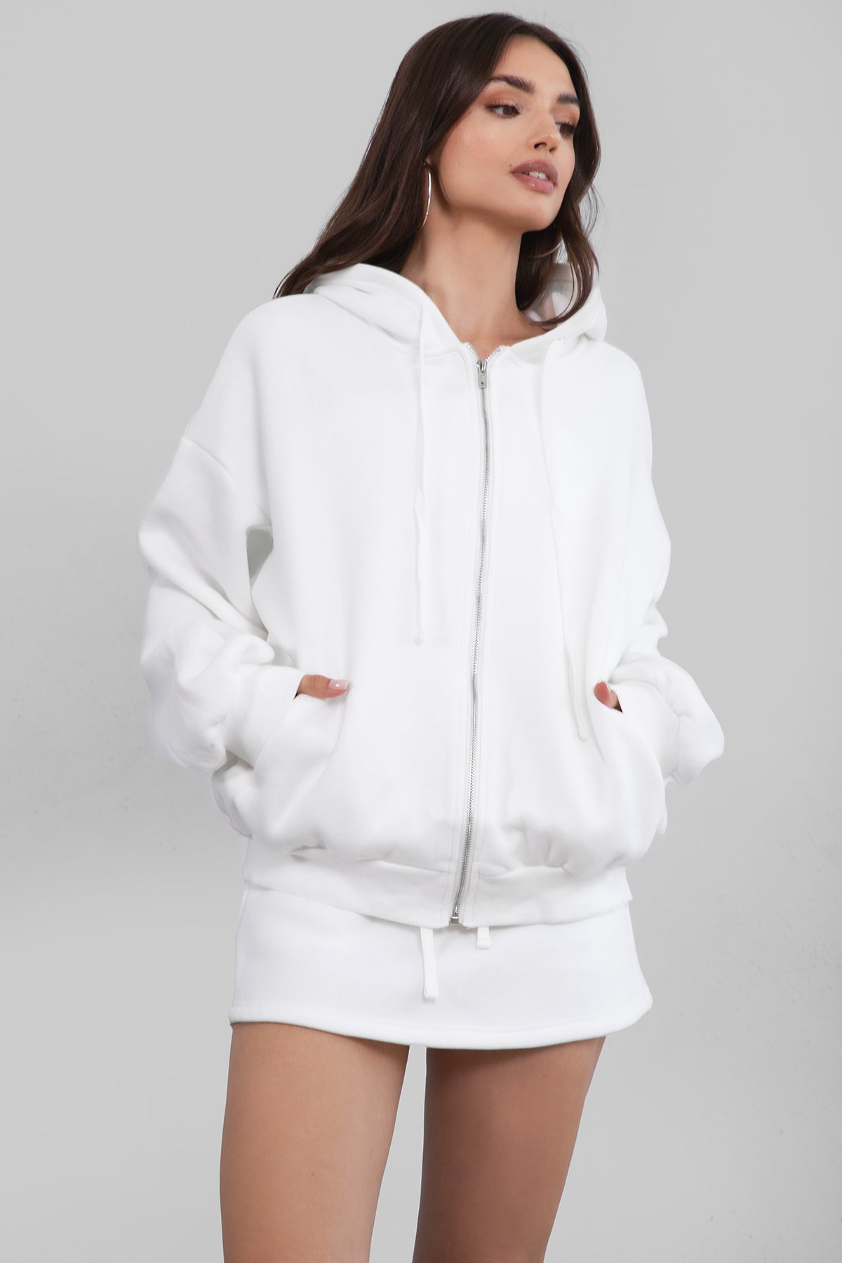 Classic white oversized zip-up hoodie with a thick fleece fabric and dropped shoulder design by Tic Toc.