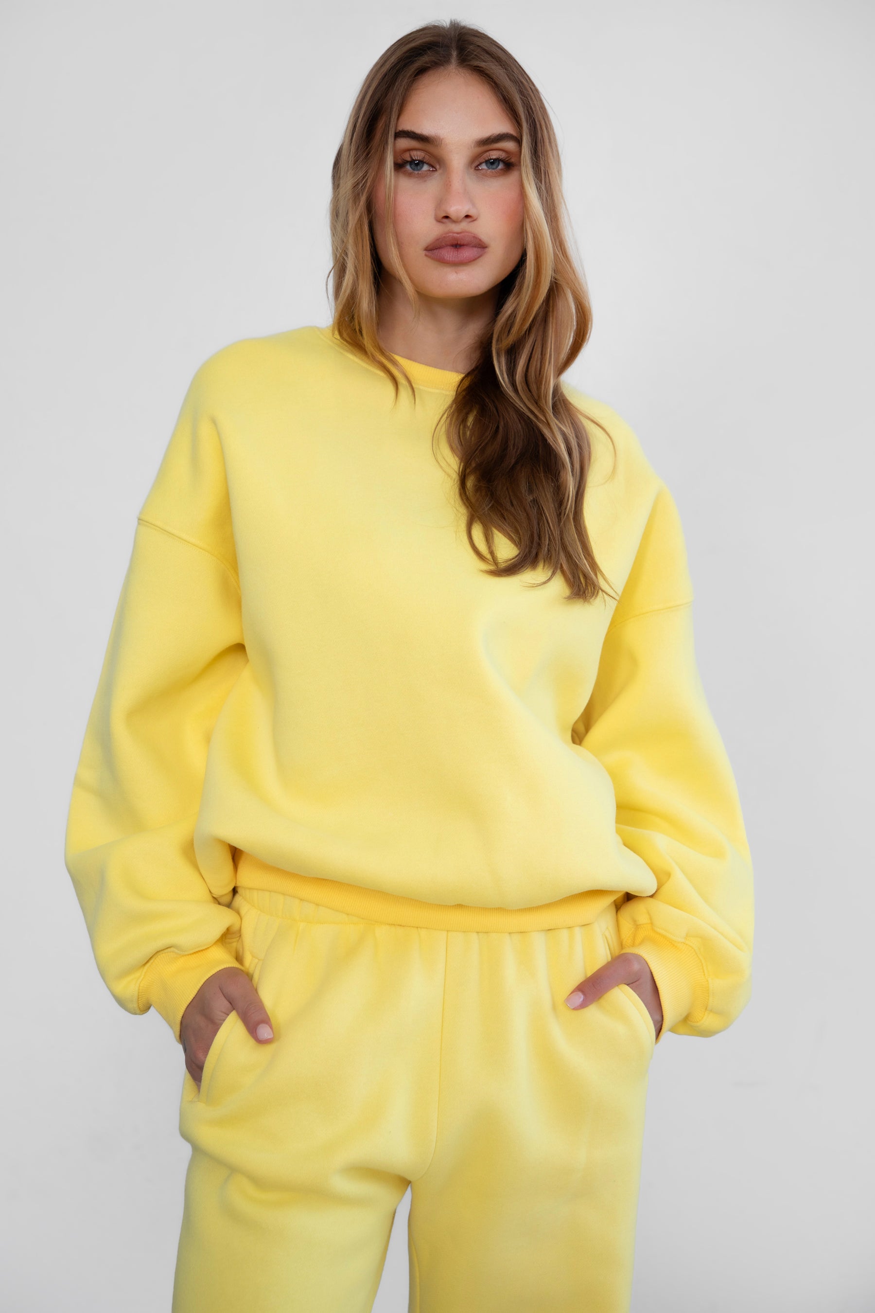 VARSITY crew neck fleece pullover sweatshirt in matching Essentials Plush Collection shades in yellow